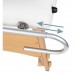 Massage table pad holder